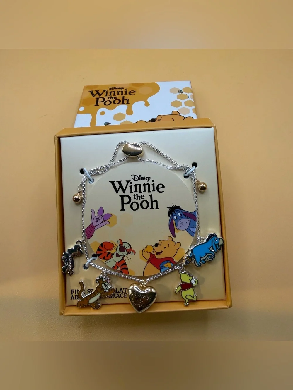 Disney Winnie the Pooh Silver Charm Bracelet with Yellow, Blue & Green Accents